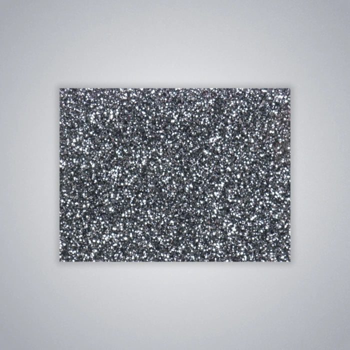 Dark Gray Glitter Acrylic Sheet. Rich charcoal base with embedded glitter for a dramatic sparkling effect. Ideal for bold laser-cut signage, night-themed party decor, and statement accessories. Compatible with laser cutters like Glowforge, xTool, and OMTech. Ideal for precise cuts and detailed designs. Perfect for hobbyists, Etsy sellers, and small business owners creating personalized signs, wedding decor, name tags, ornaments, cake toppers, and custom gifts. Pre-cut to fit standard laser beds.