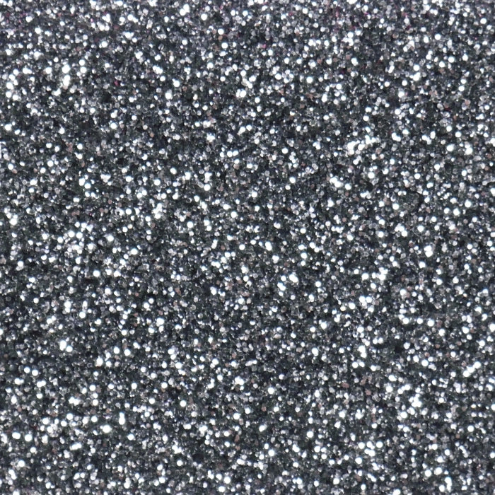 Close-up of Dark Gray Glitter Acrylic Sheet. Rich charcoal base with embedded glitter for a sparkling effect. Ideal for bold laser-cut signage, party decor, and statement accessories. Compatible with laser cutters like Glowforge, xTool, and OMTech. Ideal for precise cuts and detailed designs. Perfect for hobbyists, Etsy sellers, and small business owners creating personalized signs, wedding decor, name tags, ornaments, cake toppers, and custom gifts. Pre-cut to fit standard laser beds.