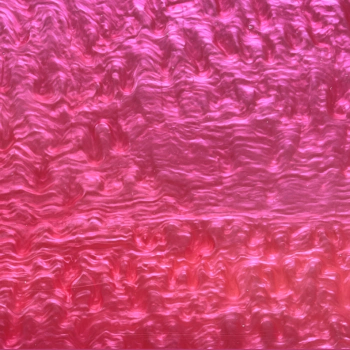 Close-up of Red Pearl Acrylic Sheet. Deep red hue with a luminous, swirling pearlescent finish. Ideal for luxury signage, bold event decor, and striking laser-cut accessories. Compatible with laser cutters like Glowforge, xTool, and OMTech. Ideal for precise cuts and detailed designs. Perfect for hobbyists, Etsy sellers, and small business owners creating personalized signs, wedding decor, name tags, ornaments, cake toppers, and custom gifts. Pre-cut to fit standard laser beds.