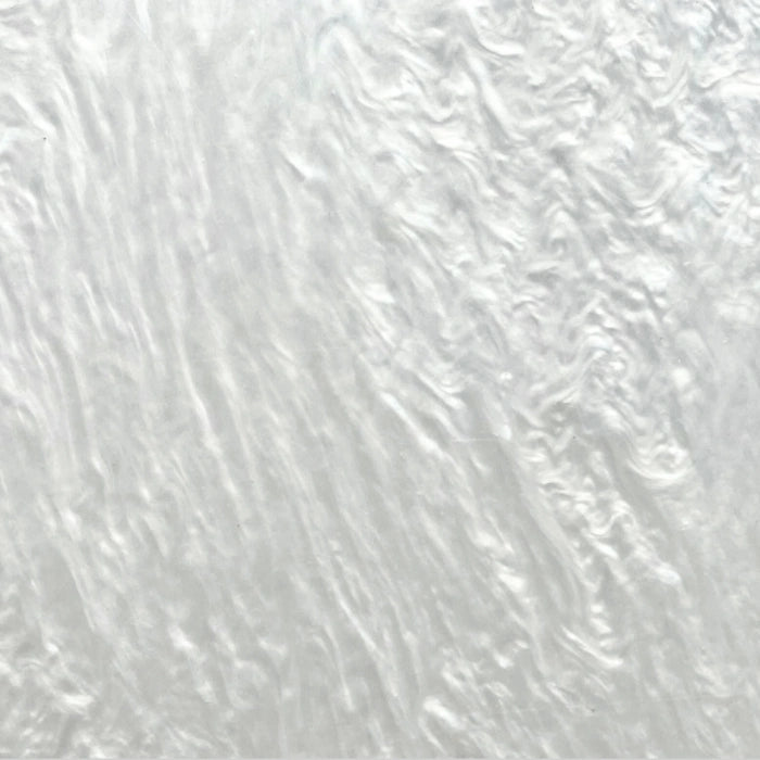 Close-up of White Pearl Acrylic Sheet. Soft white base with a subtle pearlescent shimmer. Ideal for bridal designs, elegant signage, and classic decor projects. Compatible with laser cutters like Glowforge, xTool, and OMTech. Ideal for precise cuts and detailed designs. Perfect for hobbyists, Etsy sellers, and small business owners creating personalized signs, wedding decor, name tags, ornaments, cake toppers, and custom gifts. Pre-cut to fit standard laser beds.
