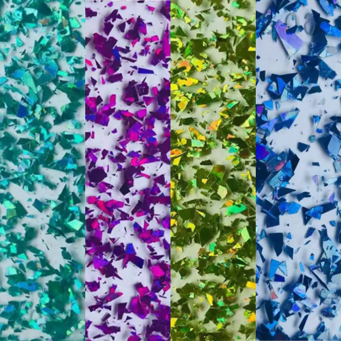 Close-up of Glitter Acrylic Sheet Bundle. Multi-pack of vibrant glitter acrylics for colorful crafting. Great for creators who want variety in sparkle, perfect for party decor and eye-catching laser designs. Compatible with laser cutters like Glowforge, xTool, and OMTech. Ideal for precise cuts. Perfect for hobbyists, Etsy sellers, and small business owners creating personalized signs, wedding decor, name tags, ornaments, cake toppers, and custom gifts. Pre-cut to fit standard laser beds.